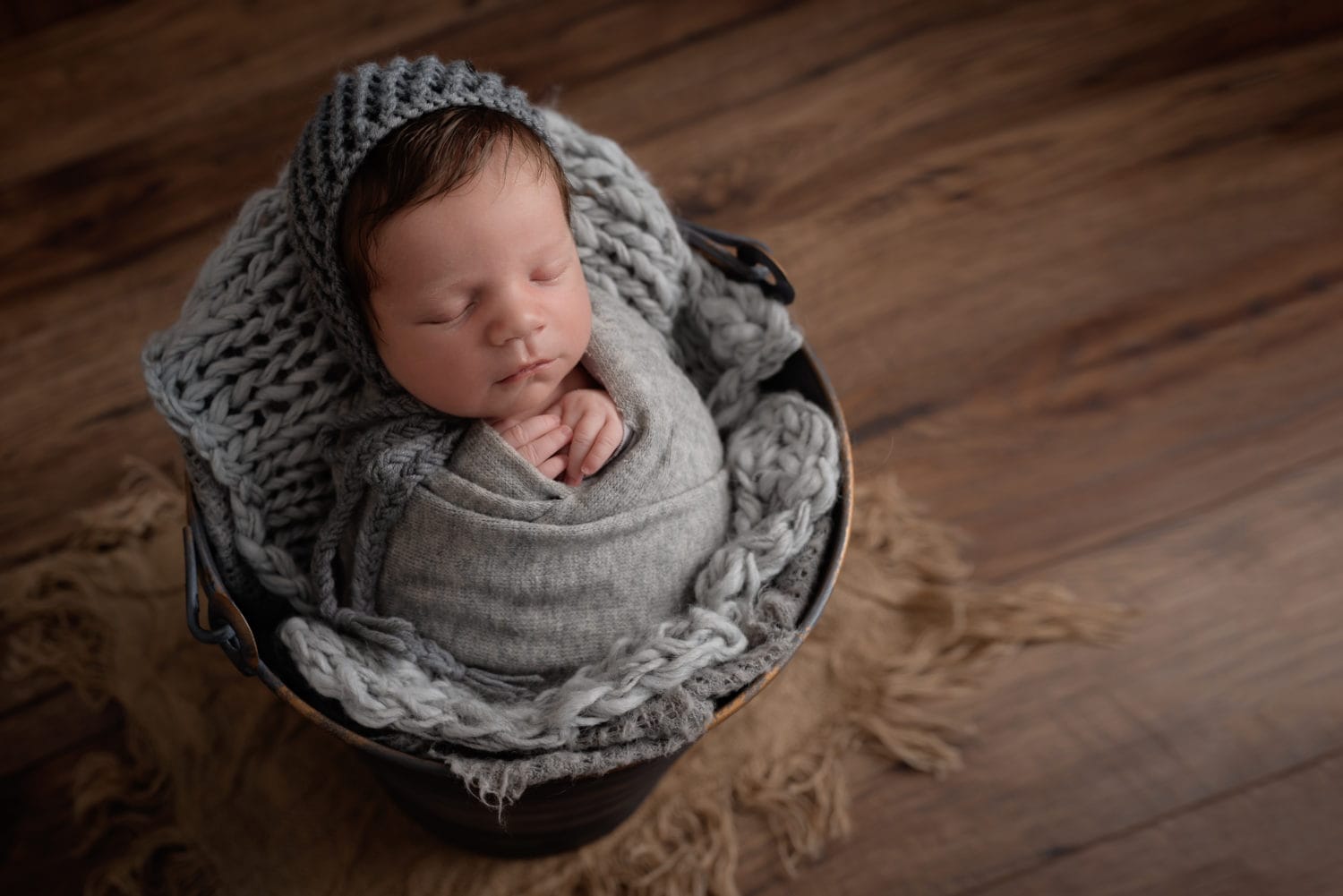 baby wrapped up for a newborn shoot