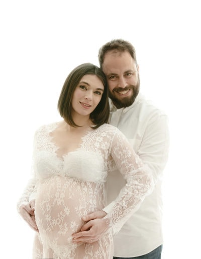 mum and dad having a maternity shoot